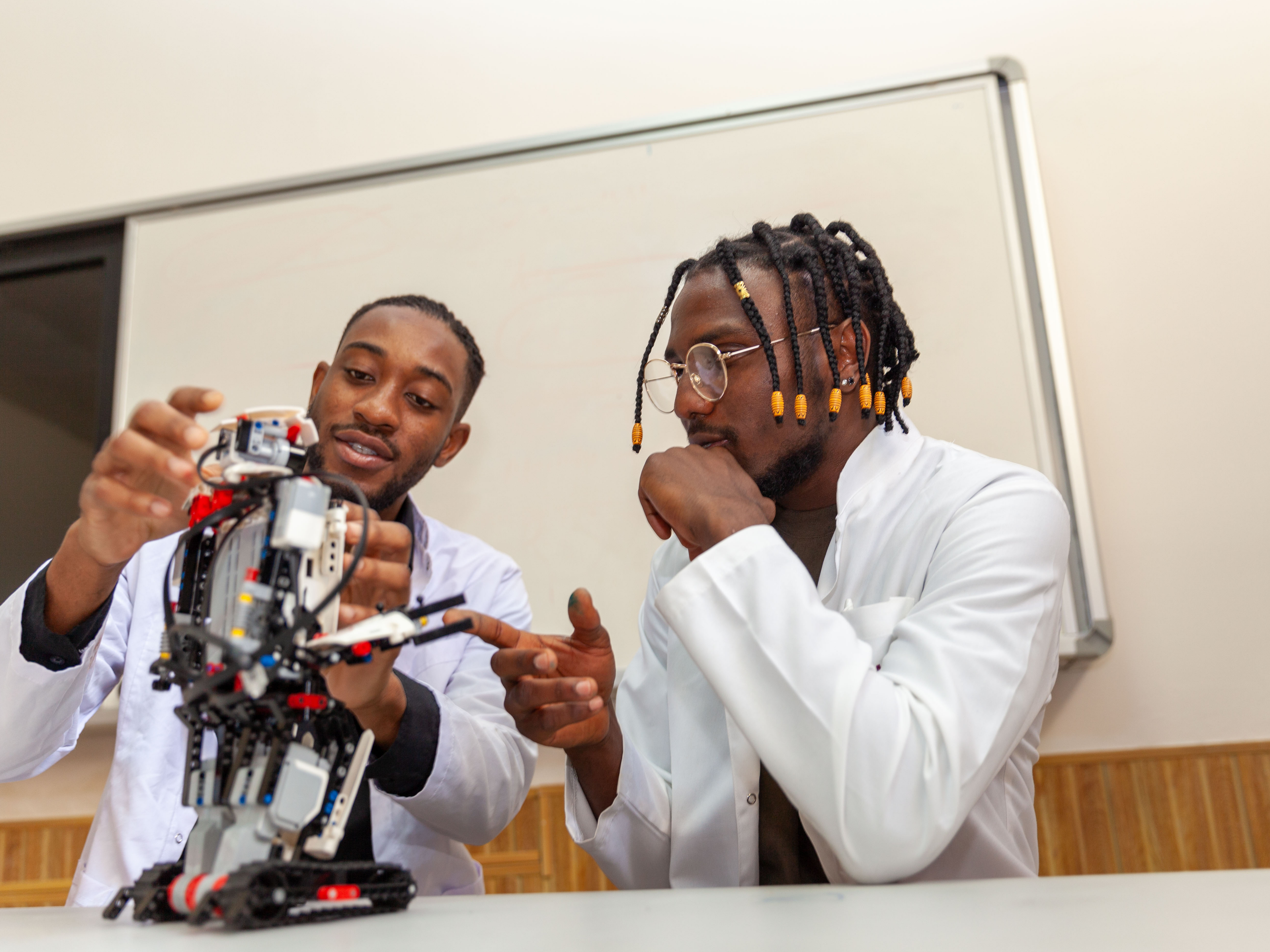 Young innovators collaborating on a STEM robotics project