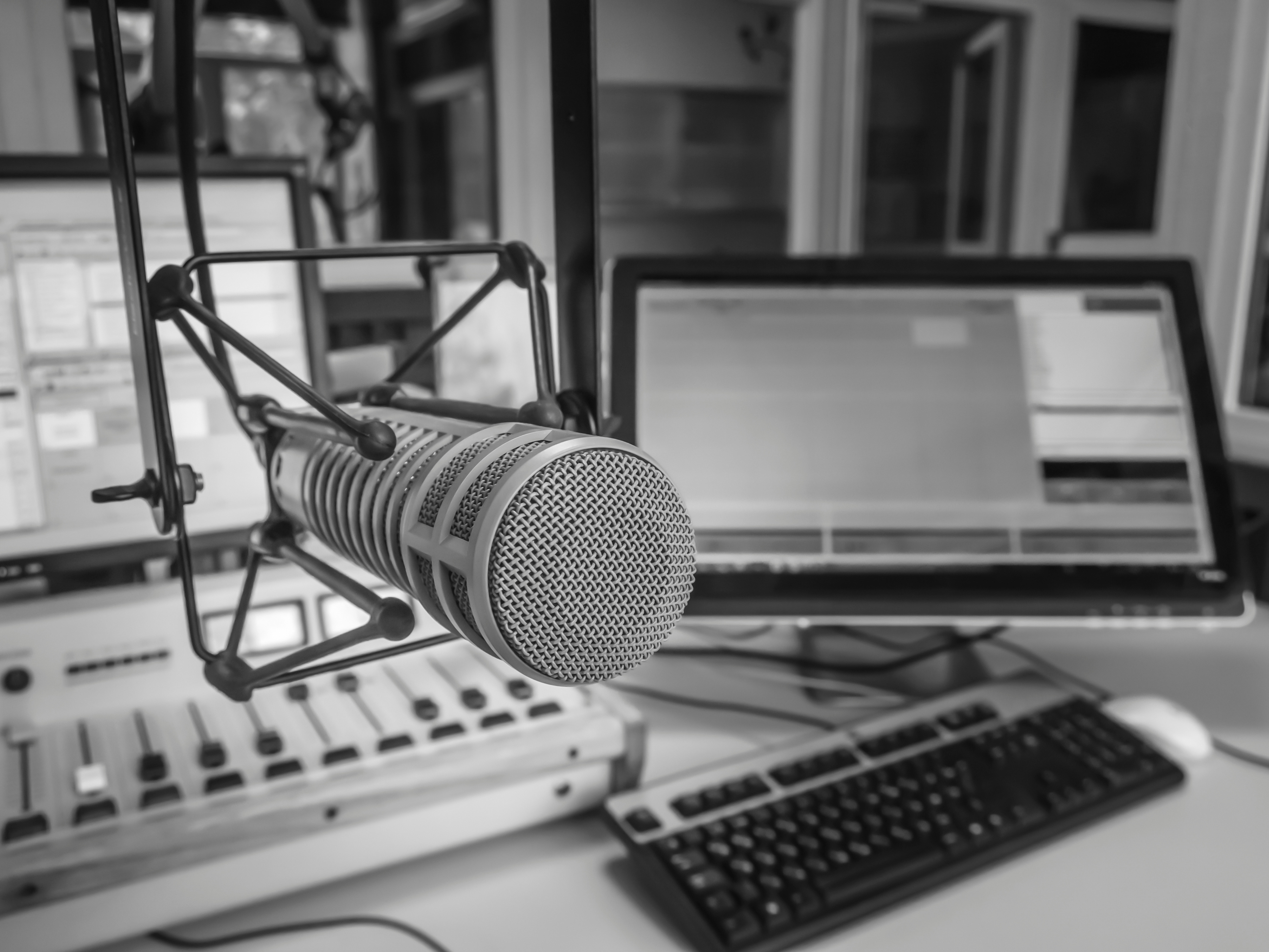 Close-up of a radio broadcast console and microphone